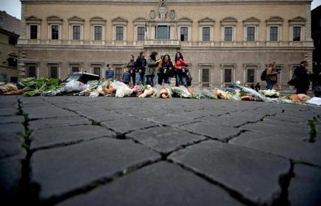Flowers were placed outside the French Embassy in Rome on Saturday. 
